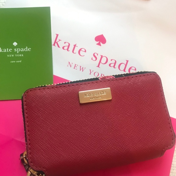 kate spade Handbags - Kate Spade Laurel Way Rosie Double Zip Around Wall